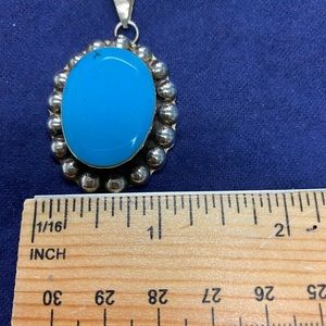 Pendant with blue stone